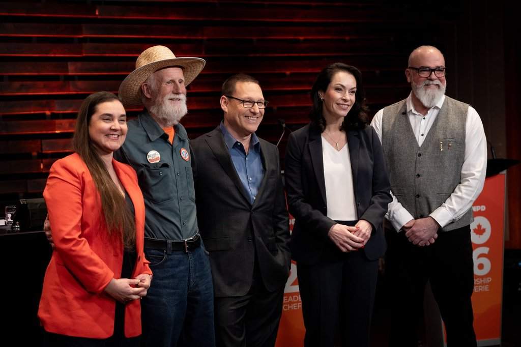 NDP leadership candidates Tanille Johnston from left to right, Tony McQuail, Avi Lewis, Heather McPherson and Rob Ashton, pose for a photo after the NDP English language leadership debate, in New Westminster, B.C., on Thursday, Feb. 19, 2026. 