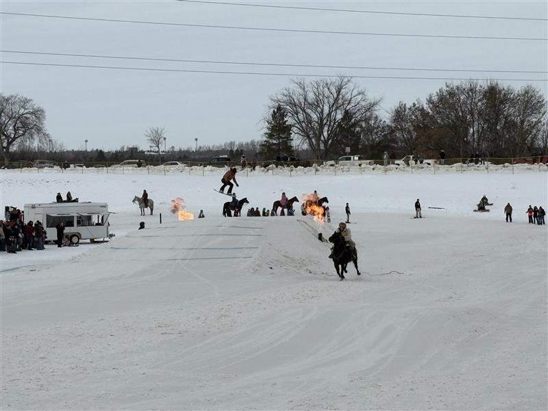 Huge crowds gathered to watch Skijor YXE. Skiers and snowboarders make incredible jumps while being pulled by horses.