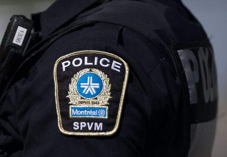 A Montreal police shoulder patch is seen on an officer in Montreal on Thursday, Aug. 29, 2024. 