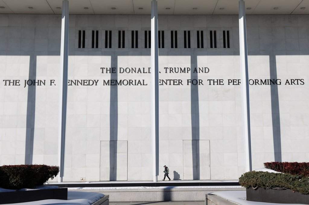FILE - A woman walks outside The John F. Kennedy Memorial Center For The Performing Arts on Feb. 2, 2026, in Washington. 