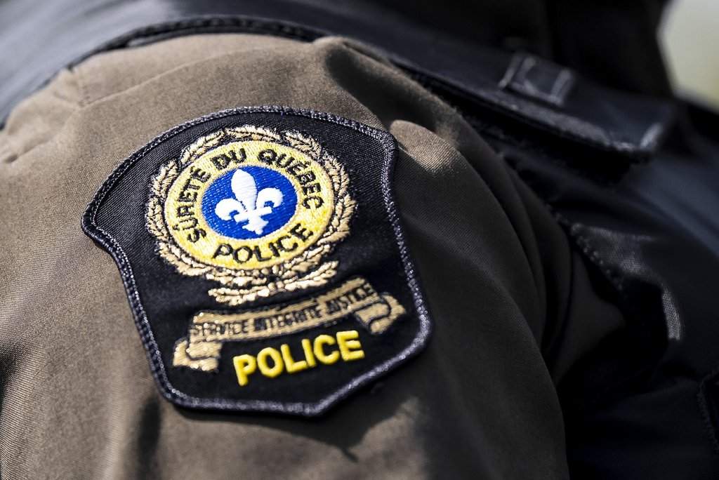 Quebec provincial police badge on a police officer's uniform in Vaudreuil-Dorion, Wednesday, 17 September 2025. 