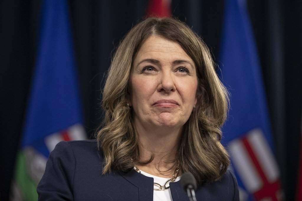 Premier Danielle Smith speaks to the media at the Legislature in Edmonton, on Wednesday, Dec. 10, 2025. 