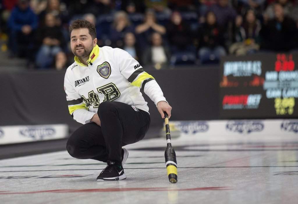Matt Dunstone, skip of Team Manitoba-Dunstone, watches his last stone of the 10th End during the semifinal against Team Canada at the Montana's Brier Canadian men's curling championship, in St. John's, N.L., on Sunday, March 8, 2026. THE CANADIAN PRESS/Paul Daly.
