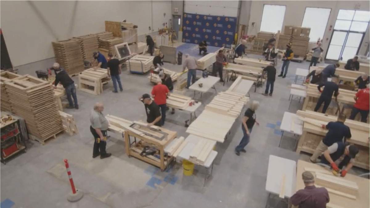 Volunteers with Sleep in Heavenly Peace Winnipeg built parts for 22 beds to be taken to children in need in Pukatawagan First Nation on Feb. 26.