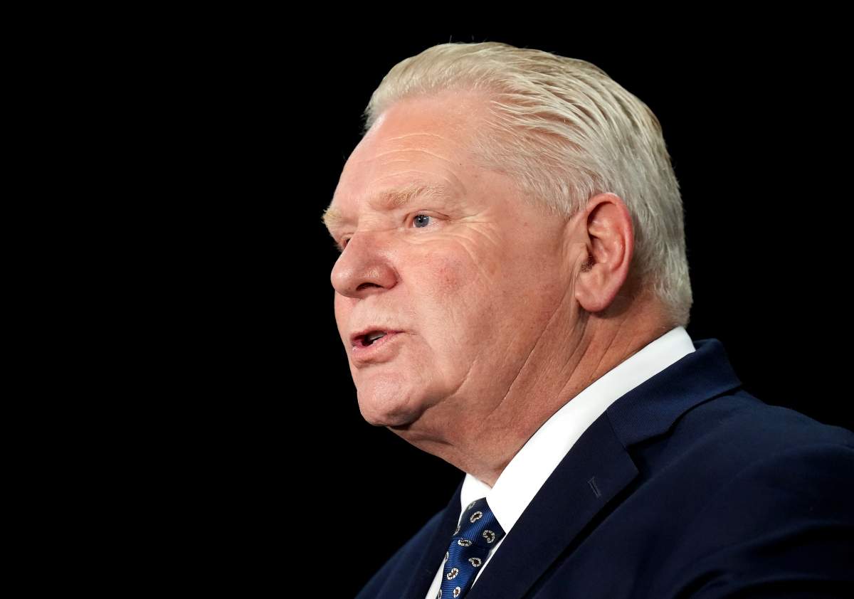 Ontario Premier Doug Ford speaks to the media regarding the federal governments decision to allow Chinese EV's into Canada at Queen's Park in Toronto on Jan. 21, 2026.