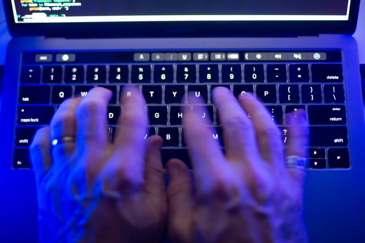 A man uses a computer keyboard in Toronto on Monday, Oct. 9, 2023, in this photo illustration. 