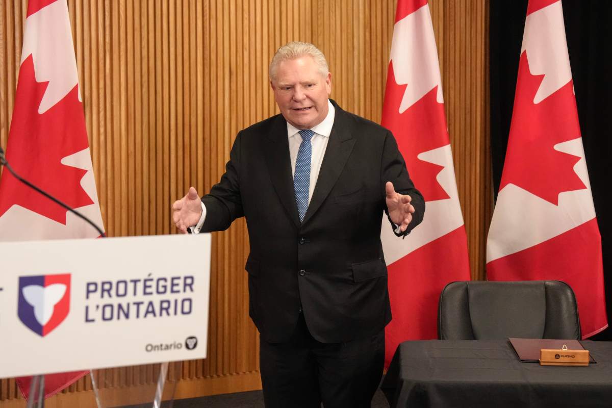 Ontario Premier Doug Ford speaks to journalists during an availability at the Ontario legislature, in Toronto on Monday, March 2, 2026.