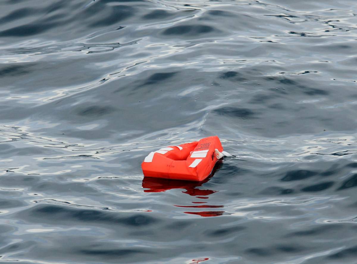 A lifejacket from the Queen of the North ferry floats in the waters of Wright Sound near Hartley Bay, B.C., in this March 22, 2006 file photo.