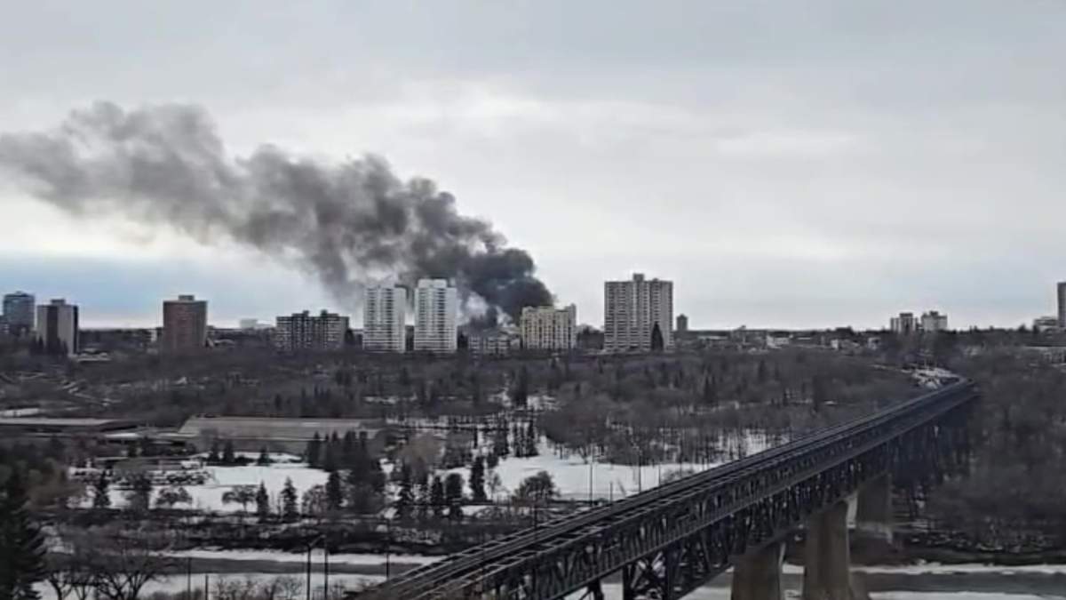 Smoke from a fire near 85 Avenue and 108 Street in south Edmonton on March 19, 2026.