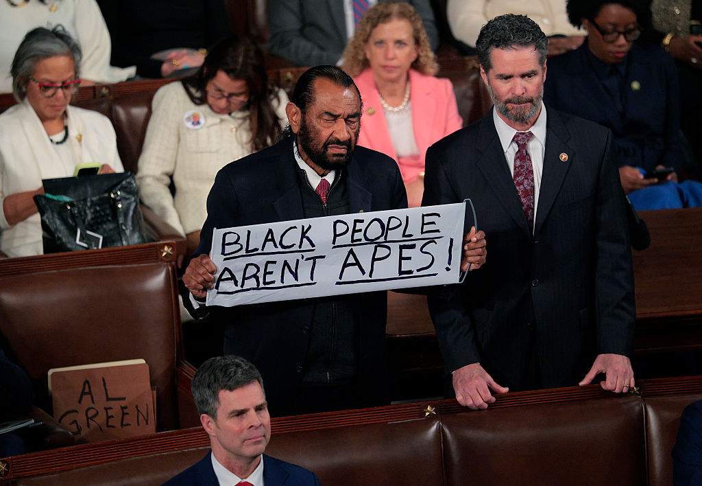 ep. Al Green (D-TX) holds up a sign as Trump delivers his State of the Union address during a Joint Session of Congress at the U.S. Capitol on February 24, 2026, in Washington, DC.