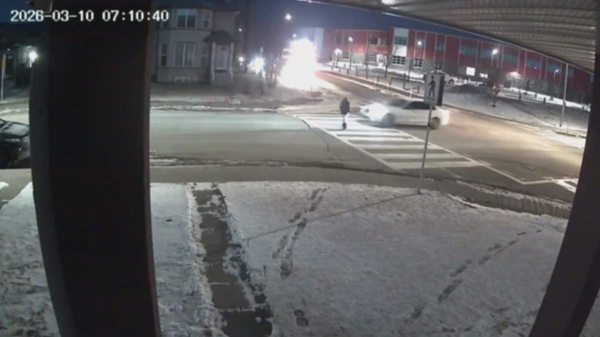 Security footage shows the moments before a vehicle struck a child walking through a marked crosswalk in Calgary’s Taradale neighbourhood on Mar. 10, 2026. Police say the child was taken to hospital with a broken leg and they’re now searching for a white four-door sedan.