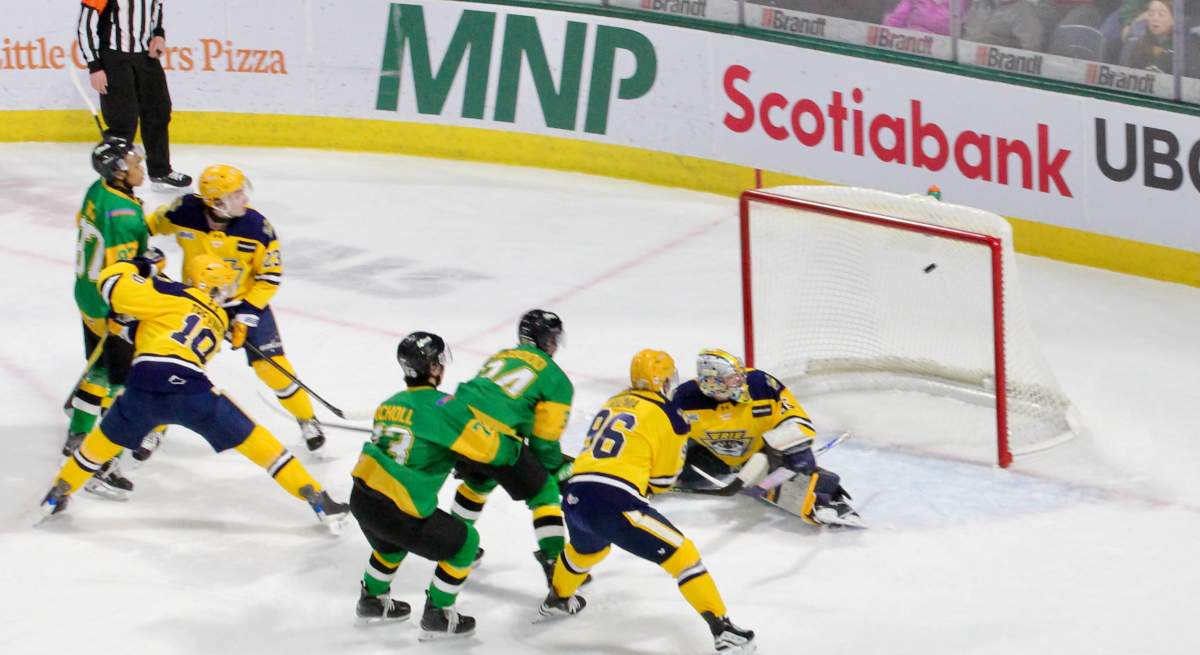 Cohen Bidgood of the London Knights scores one of his three goals against the Erie Otters in a game played on March 6, 2026 at Canada Life Place.