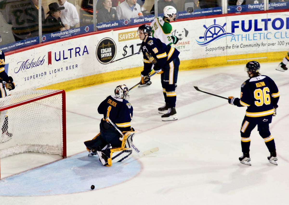 Owen Miniotas celebrates his first OHL point with Rene Van Bommel in a game between teh London Knights and the Erie Otters on March 7, 2026 at the Erie Insurance Arena.