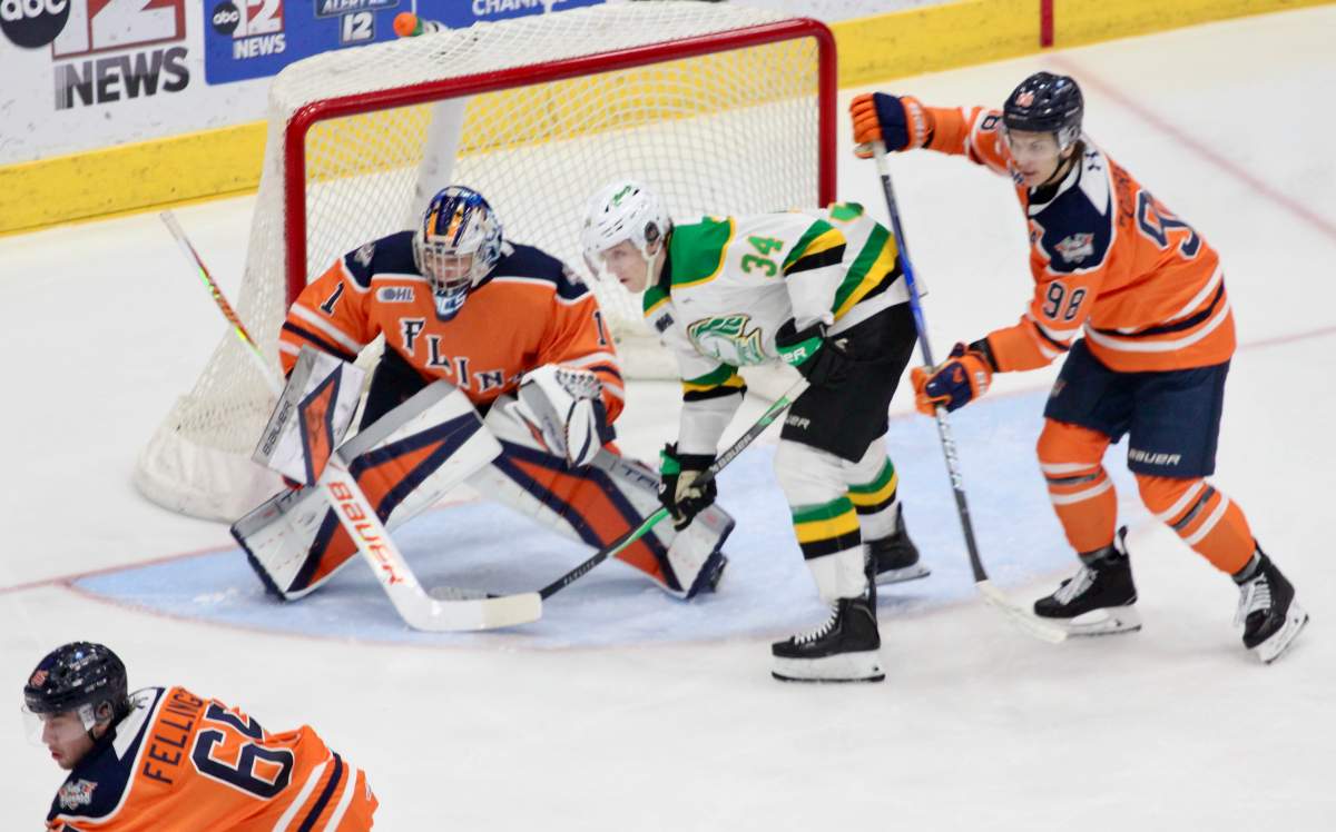 Cohen Bidgood of the London Knights sets up in front of the Flint Firebirds net in a game played at the Dow Event Center on March 21, 2026.