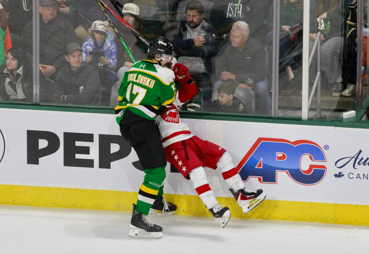 Maksim Sokolovskii of the London Knights finishes a hit in Game 1 of the best-of-7 series against Sault Ste. Marie on March 27, 2026 at Canada Life Place.