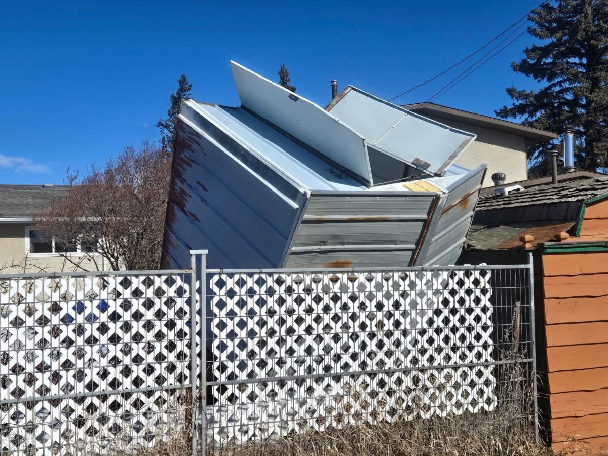 A metal shed was blown into a yard in west Edmonton's Meadowlark area on Sunday, March 8, 2026.