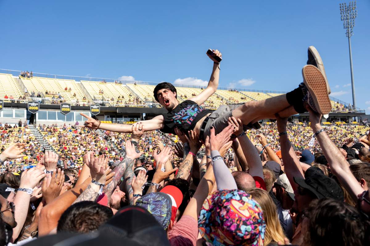 A festivalgoer crowd surfs during Sonic Temple Art and Music Festival on May 19, 2024, at Historic Crew Stadium in Columbus, Ohio. (Photo by Amy Harris/Invision/AP).
