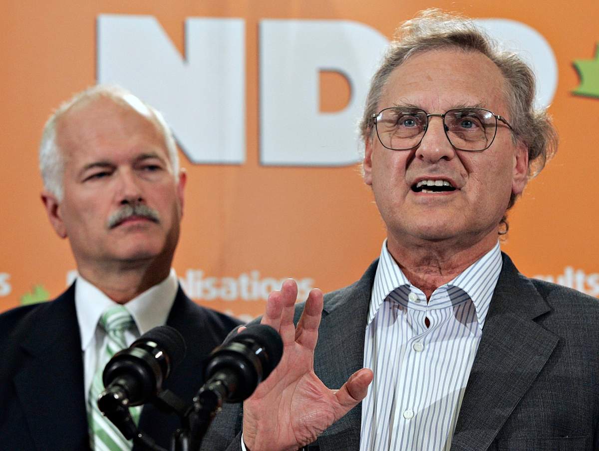 Steven Lewis, right, former UN Special Envoy for HIV/AIDS in Africa, responds to media at a news conference at the beginning of a three-day convention as NDP Leader Jack Layton looks on Friday, Sept. 8, 2006 in Quebec City. (CP PHOTO/Jacques Boissinot)