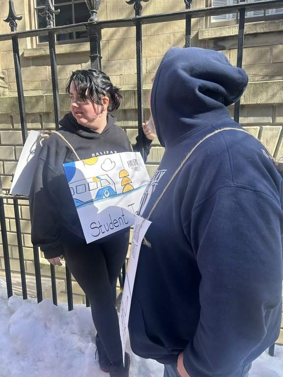Teddie Rofe, a high school student, protests in front of the Nova Scotia legislature amid the provincial government’s planned cut to the student bus pass program. THE CANADIAN PRESS/Handout – Heidi Rofe (Mandatory Credit)