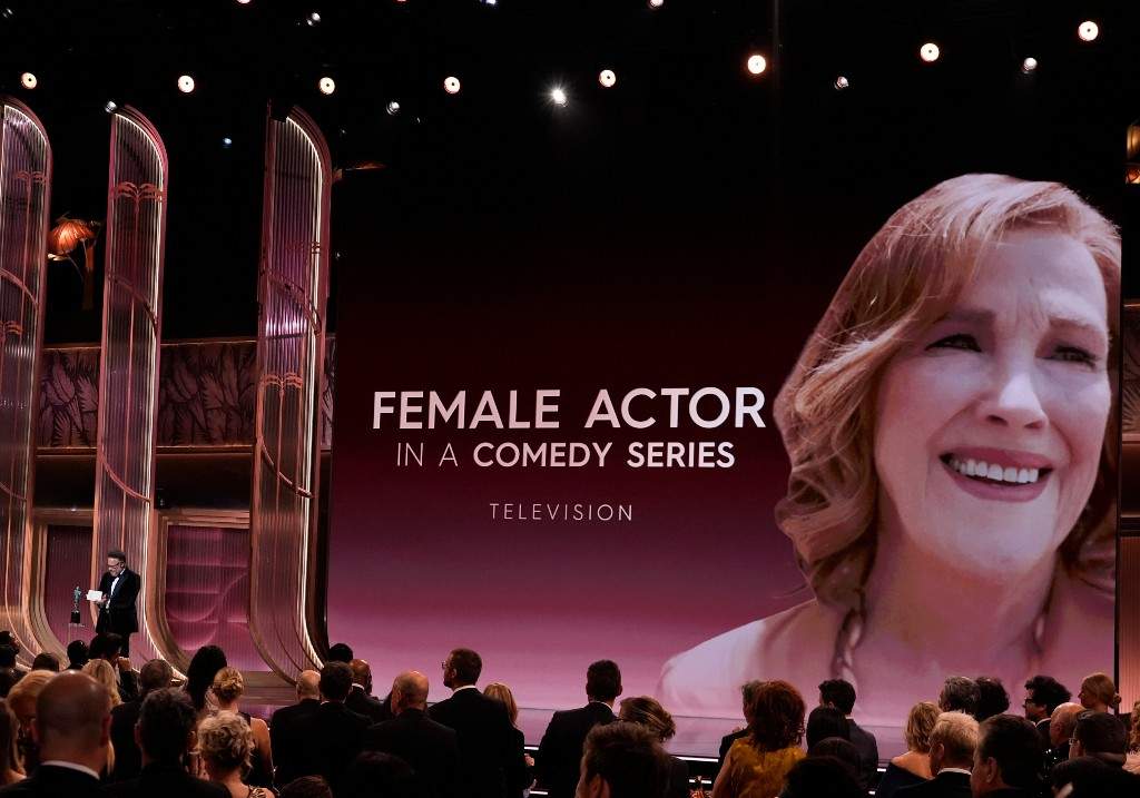 Seth Rogen accepts the award for outstanding performance by a female actor in a comedy series for 'The Studio' on behalf of Catherine O'Hara during the 32nd Annual Actor Awards on Sunday, March 1, 2026, at the Shrine Auditorium and Expo Hall in Los Angeles.