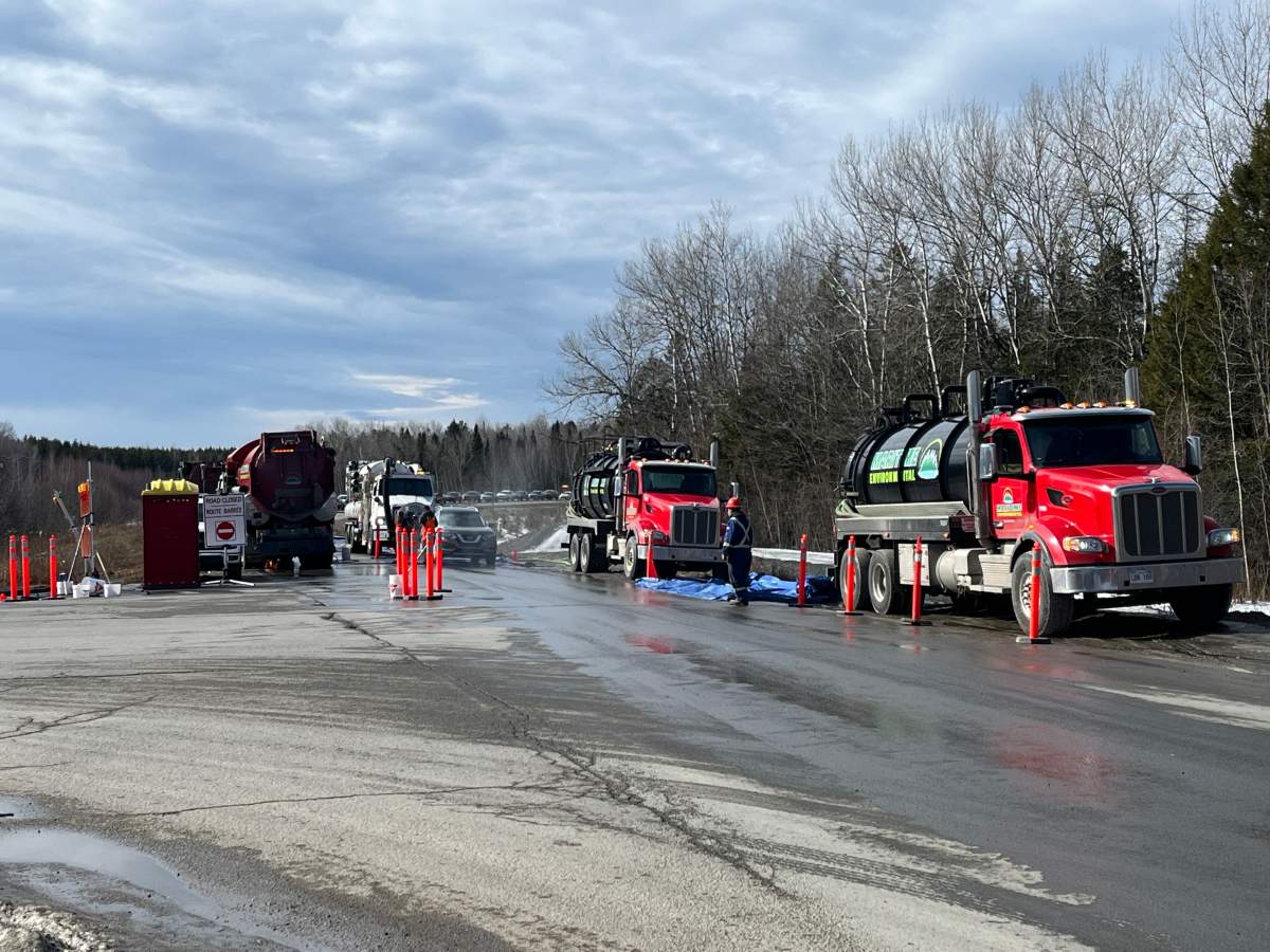 The New Brunswick government has set up a decontamination site and is holding a car wash for a third day after a chemical spill south of downtown Fredericton.