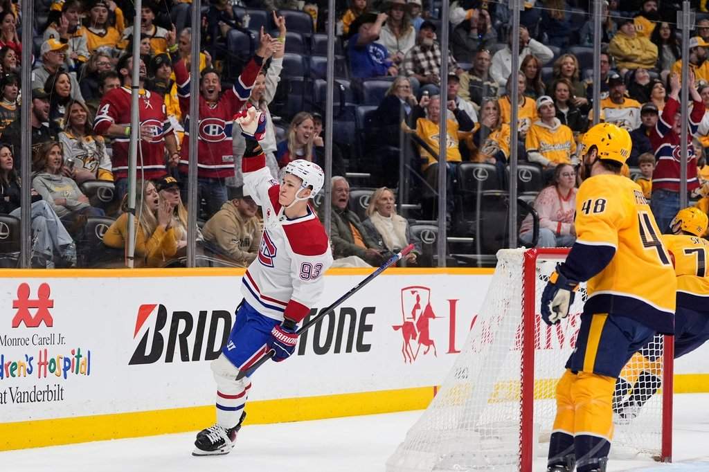 Montreal Canadiens right wing Ivan Demidov (93) celebrates his goal during the first period of an NHL hockey game against the Nashville Predators, Saturday, March 28, 2026, in Nashville, Tenn. (AP Photo/George Walker IV).