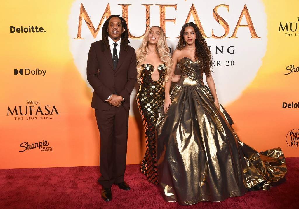 Jay-Z, from left, Beyoncé and Blue Ivy Carter arrive at the premiere of 'Mufasa: The Lion King' on Monday, Dec. 9, 2024, at the Dolby Theatre in Los Angeles.