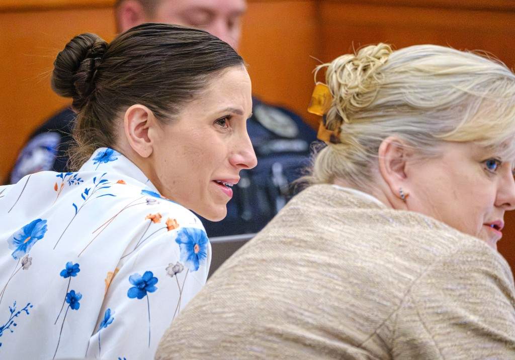 Defendant Kouri Richins, left, accused of poisoning her husband in March 2022, listens to closing arguments in Third District Court, Monday, March 16, 2026, in Park City, Utah.