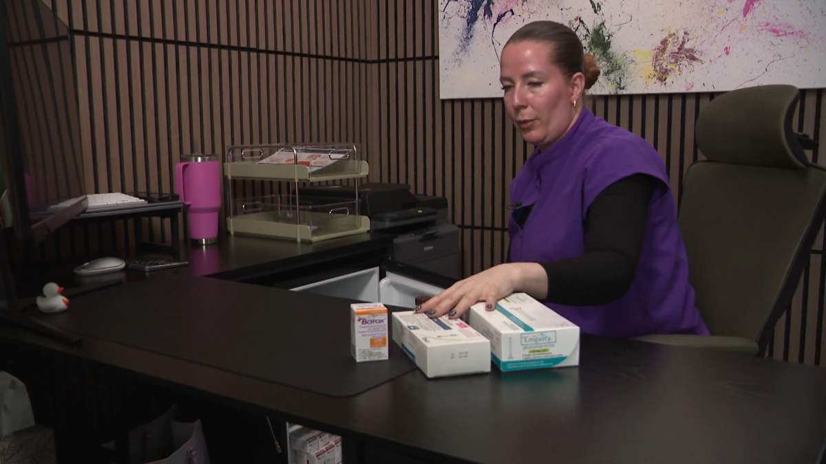 Doctor Madison Young, a migraine specialist with "My Migraine Clinic" in Calgary shows off some of the medications she can offer for the treatment of migraines.