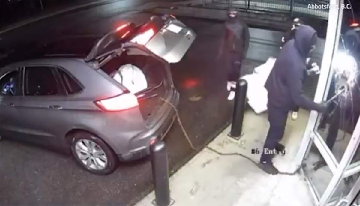 This image from a security video shows thieves targeting the House of Cards store in Abbotsford, B.C., in the early hours of  March 6, 2026. The thieves made off with Pokémon trading cards worth about $30,000.)