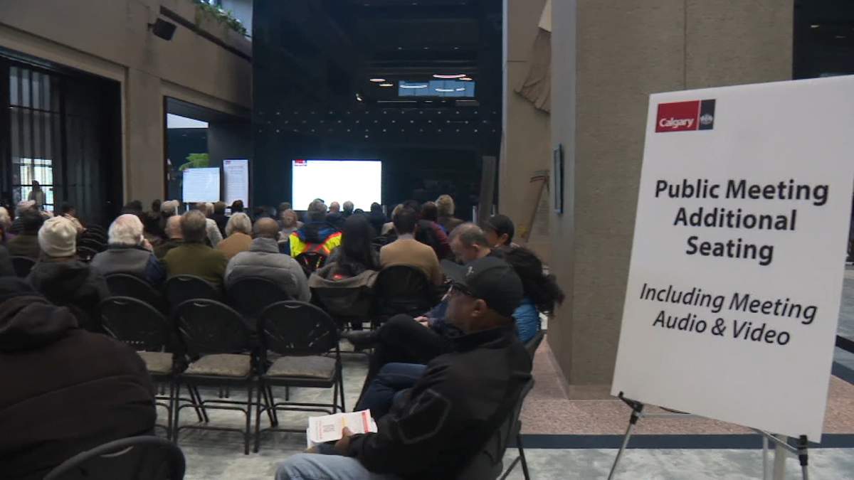 Interest in the public hearing is so great that the city has had to set up overflow seating, outside of Calgary city council chambers.