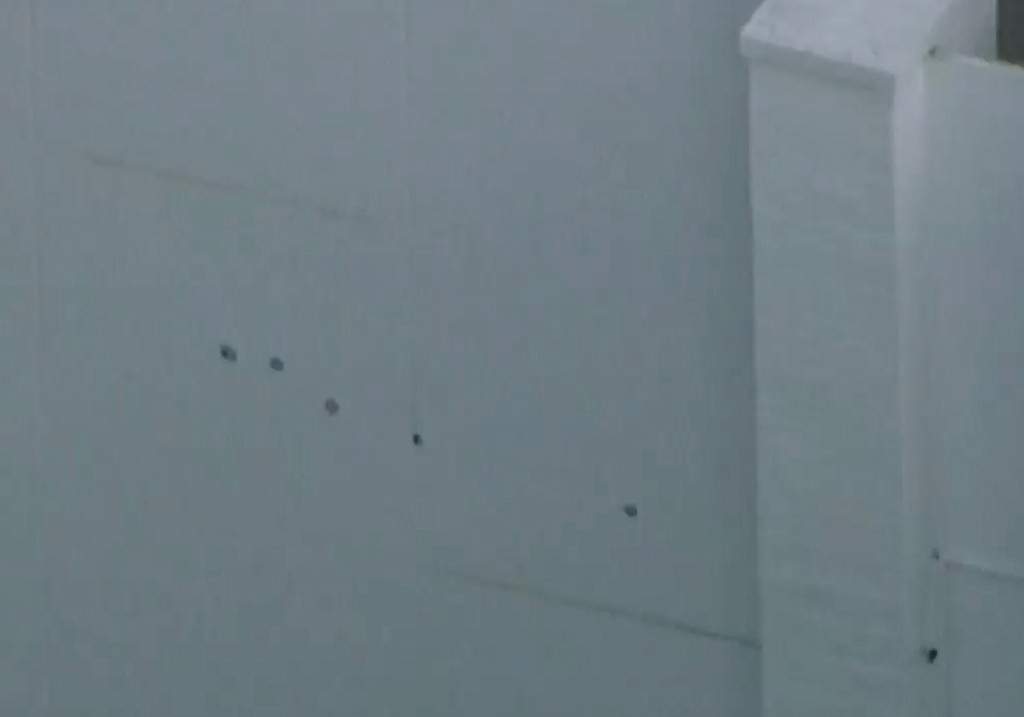 This image taken from video provided by ABC7 Los Angeles on Monday, March 9, 2026 shows what appears to be bullet holes on a wall at singer Rihanna's home in Los Angeles.