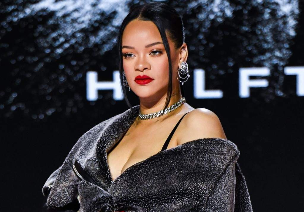 Rihanna poses for photos after the Super Bowl LVII Apple Music Halftime Show press conference held at the Phoenix Convention Center.
