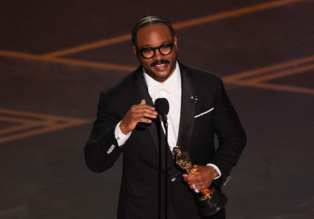 Director, producer Ryan Coogler accepts the award for Best Writing (Original Screenplay) for 'Sinners' onstage during the 98th Annual Academy Awards at the Dolby Theatre in Hollywood, California on March 15, 2026.