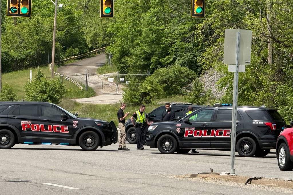 Police block a road near a chemical plant where a leak occurred Wednesday, April 22, 2026, in Institute, W.Va. (AP Photo/John Raby).