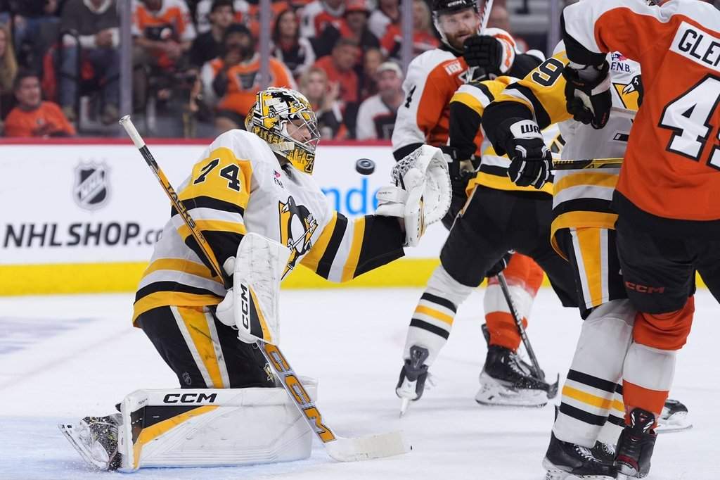 Pittsburgh Penguins' Stuart Skinner cannot stop a goal by Philadelphia Flyers' Nick Seeler during the second period of Game 3 in the first round of the NHL Stanley Cup hockey playoffs Wednesday, April 22, 2026, in Philadelphia. (AP Photo/Matt Slocum).
