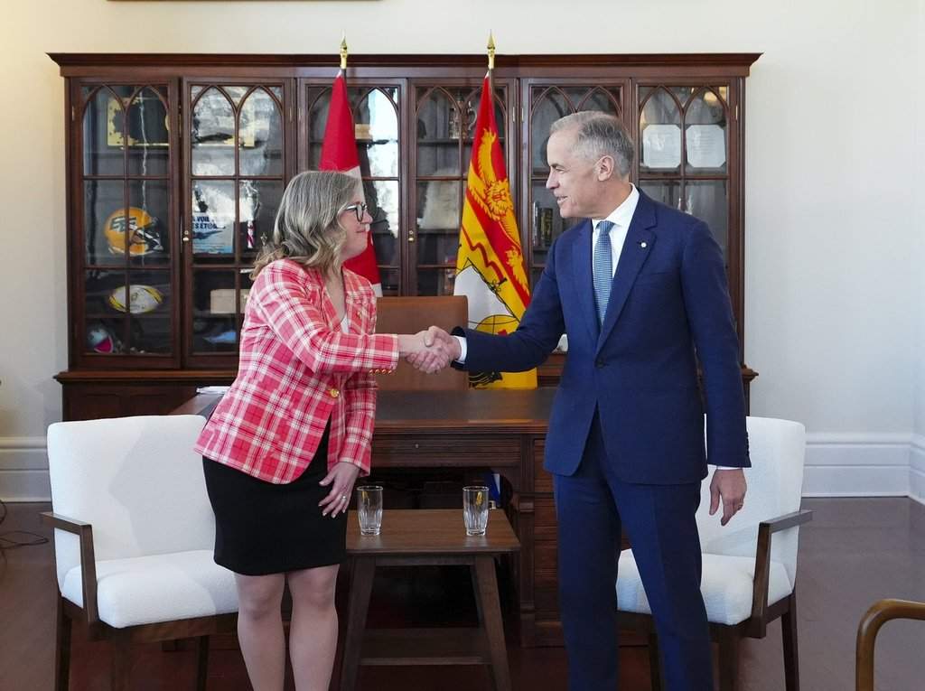Prime Minister Mark Carney meets with Premier of New Brunswick Susan Holt in his office in Ottawa on Monday, April 20, 2026. THE CANADIAN PRESS/Sean Kilpatrick.