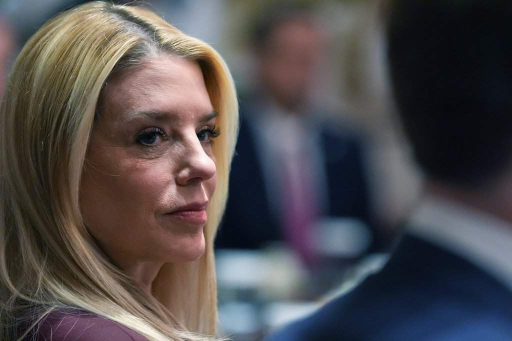 Former U.S. Attorney General Pam Bondi listens during a Cabinet meeting at the White House, Thursday, March 26, 2026, in Washington.