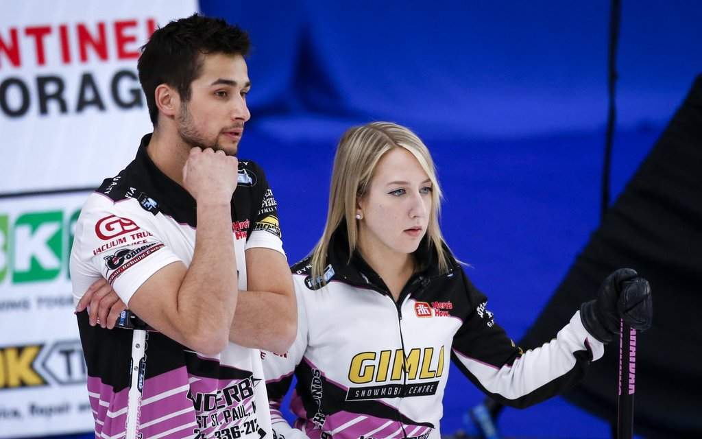 Canada’s Kadriana and Colton Lott scored six in the sixth end en route to a 12-5 win over Scotland at the world mixed doubles curling championship on Tuesday. The Lotts discuss strategy during the Canadian Mixed Doubles Curling Championship final in Calgary, Thursday, March 25, 2021. THE CANADIAN PRESS/Jeff McIntosh.