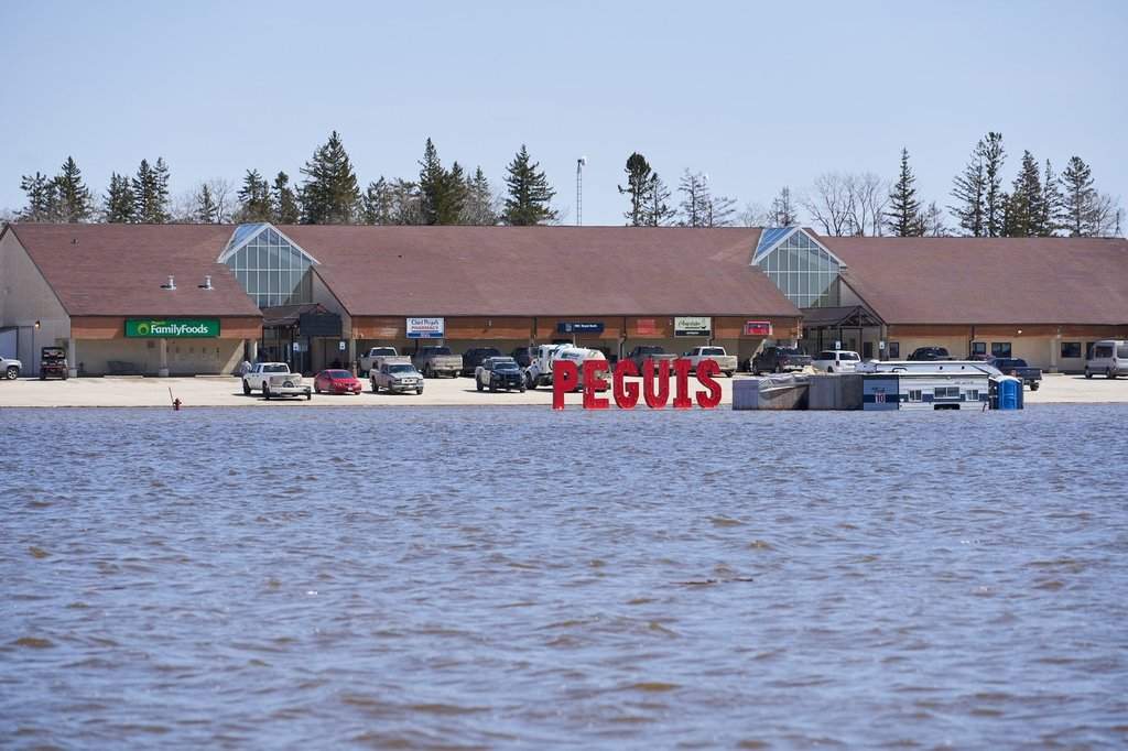 The chief of Peguis First Nation says he is monitoring conditions closely, as crews work to avoid facing a similar situation to that of 2022. Flooding is shown in Peguis First Nation, Man., Wednesday, May 4, 2022. THE CANADIAN PRESS/David Lipnowski