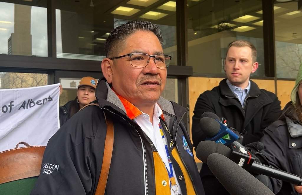 Sturgeon Lake Cree Nation Chief Sheldon Sunshine speaks outside the Edmonton law courts in Edmonton, Tuesday, April 7, 2026.
