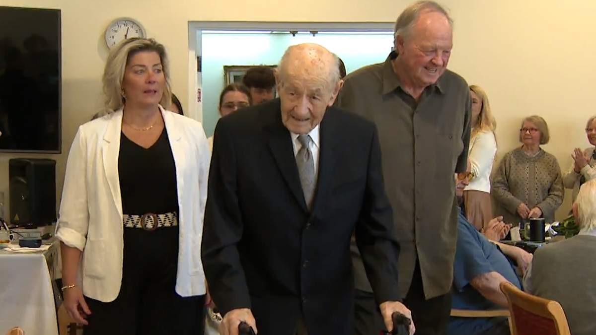 Iwan Winniczuk arrives at his birthday party with his family.