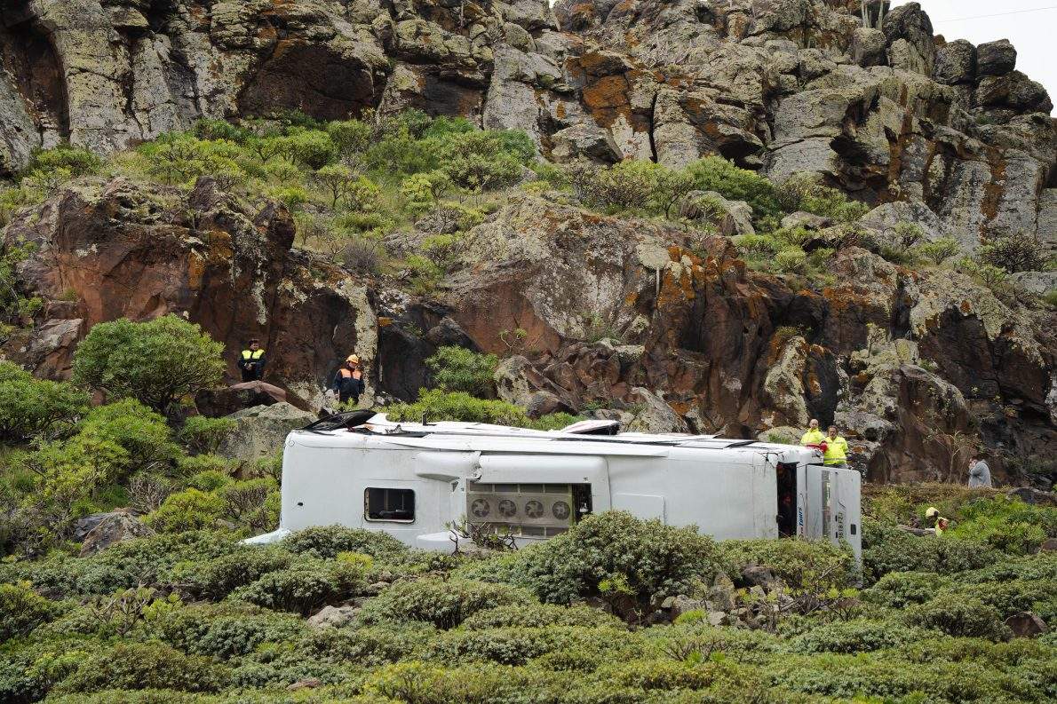 Rescuers work at the scene of a bus crash near in San Sebastian de La Gomera, in Spain’s Canary Islands, Friday, April 10, 2026. (Europa Press Canarias/Europa Press via AP)