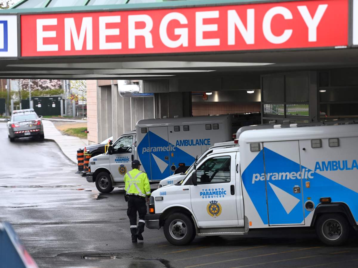Ambulances sit at the emergency room entrance at the Michael Garron Hospital in Toronto on Thursday, April 29, 2021.