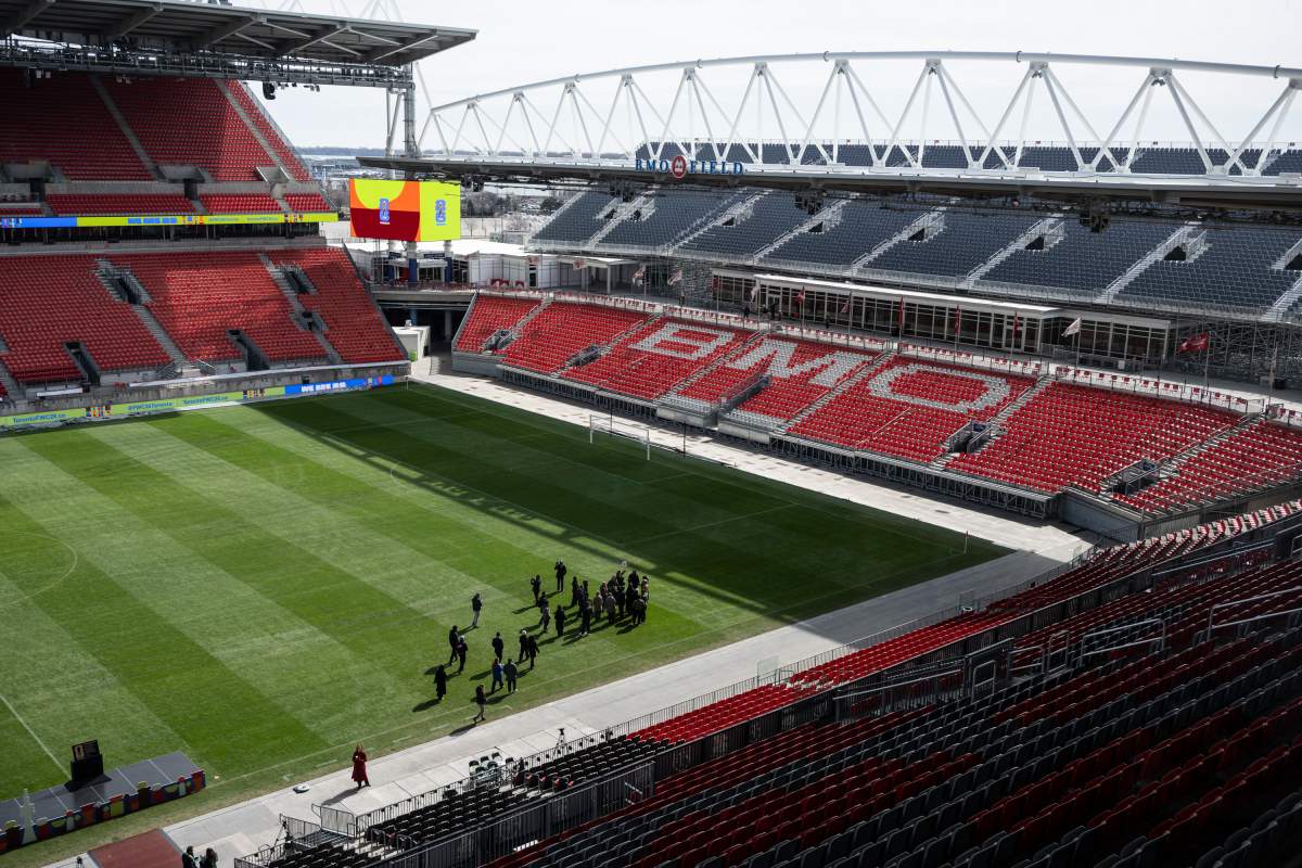 Media are seen on the pitch of BMO Field during a tour organized by MLSE and the City of Toronto to showcase the stadium’s upgrades ahead of hosting six FIFA World Cup 2026 matches in Toronto, March 24, 2026.