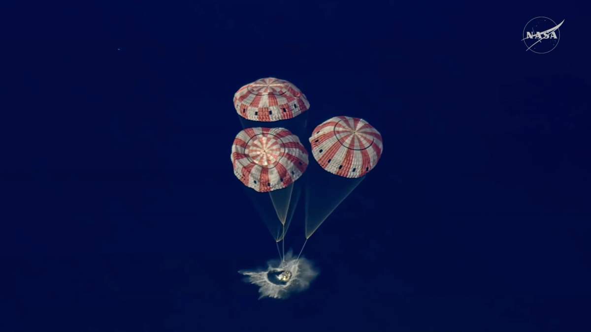 In this image from video provided by NASA, the Artemis II Orion capsule splashes down in the Pacific Ocean, on Friday, April 10, 2026.