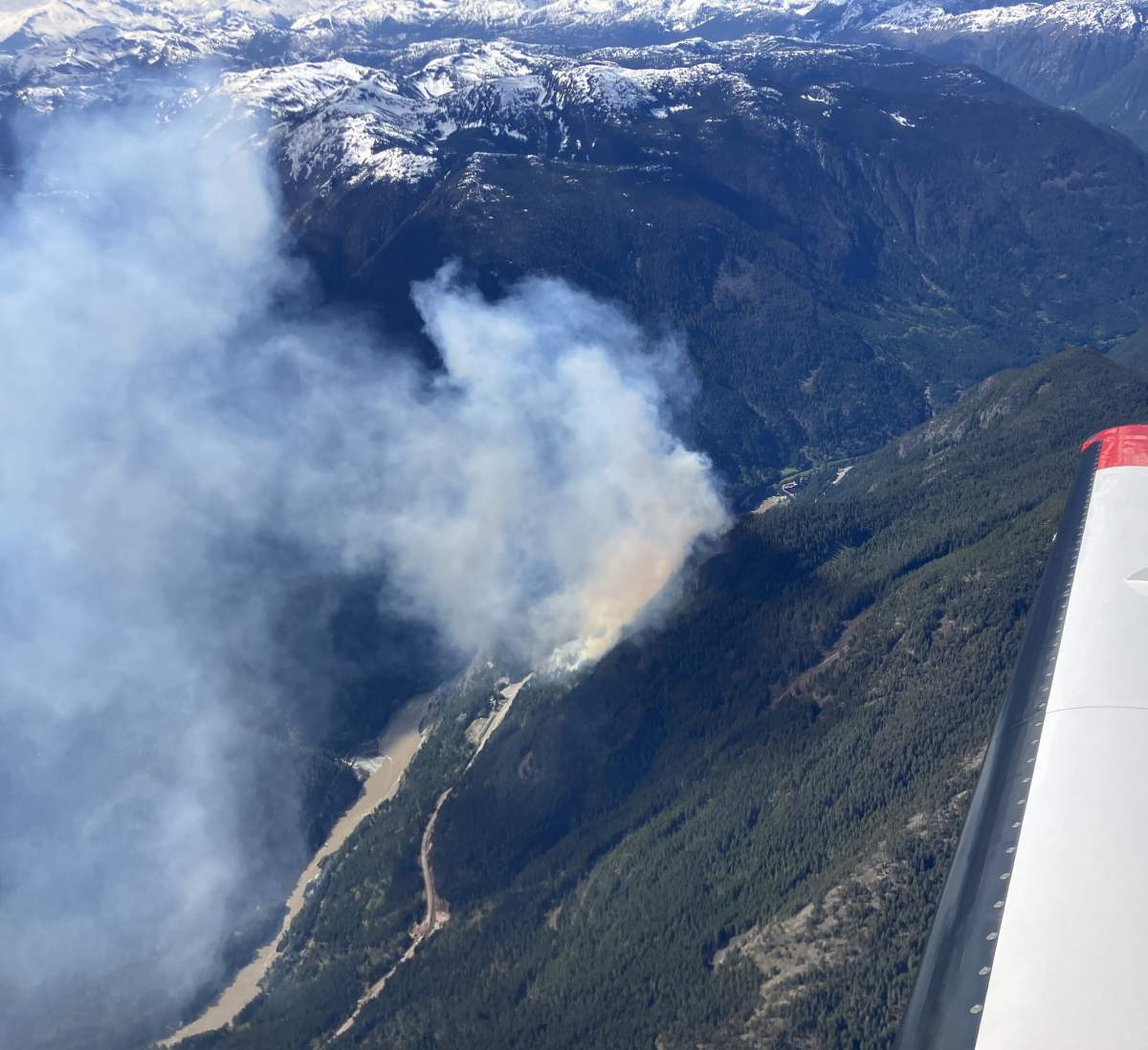 The Ferrabee wildfire is highly visible from Highway 1.