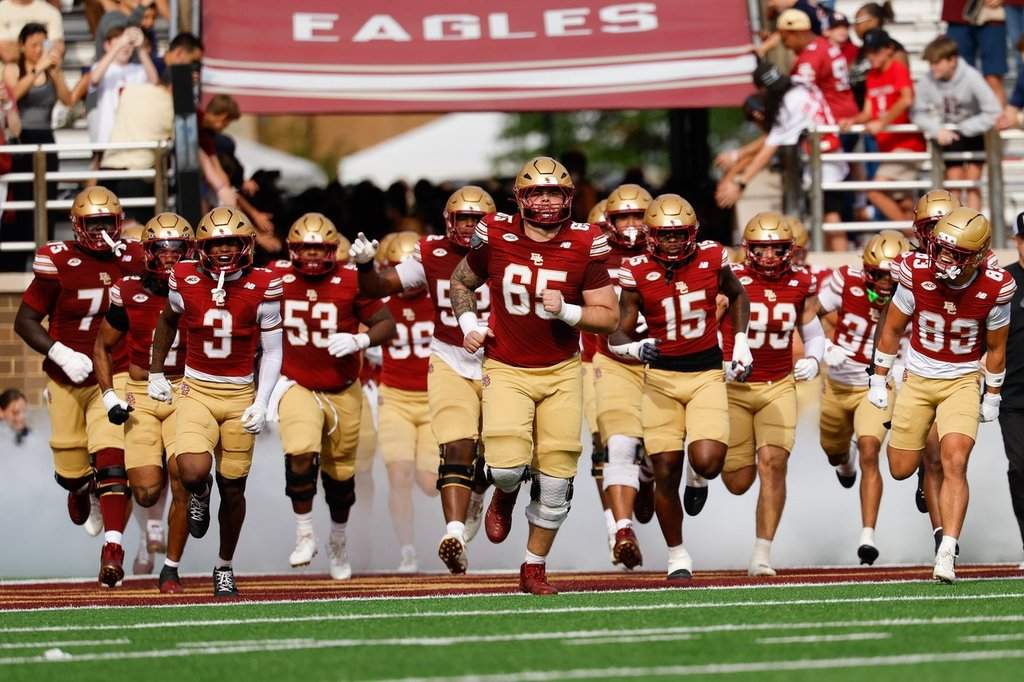 Boston College offensive lineman Logan Taylor (65) leads the team onto the field before an NCAA football game against California on Saturday, Sept. 27, 2025, in Chestnut Hill, Mass. (AP Photo/Greg M. Cooper).