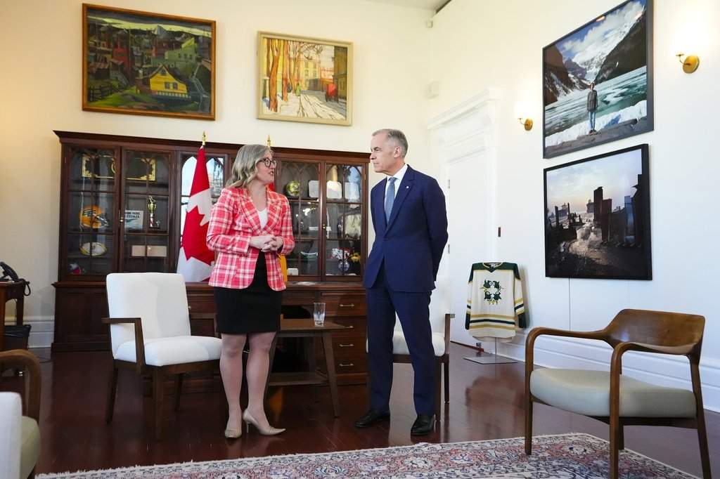 Prime Minister Mark Carney meets with Premier of New Brunswick Susan Holt in his office in Ottawa on Monday, April 20, 2026. THE CANADIAN PRESS/Sean Kilpatrick.