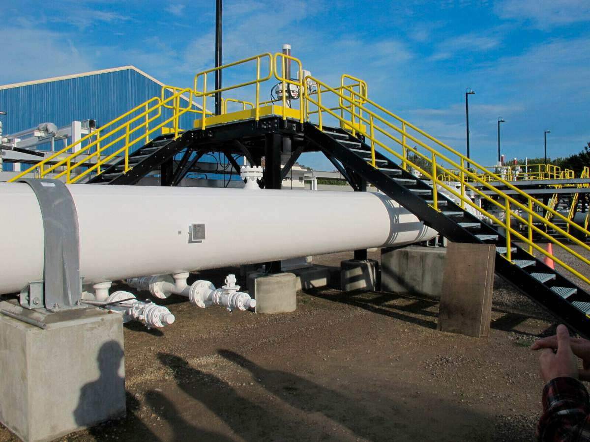 FILE - This photo taken in October 2016 shows an aboveground section of Enbridge's Line 5 at the Mackinaw City, Mich., pump station. 
